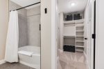 Primary shower/tub and walk in closet
